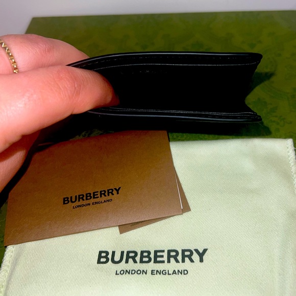 Black and white Burberry card holder. Folds open half way for extra card spots! - Picture 4 of 4